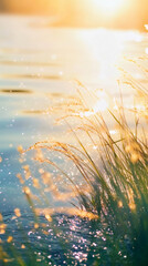 Aufkleber - Golden hour sunlight shimmering on a tranquil lake, with lush grass flourishing along the serene shore, creating a picturesque evening scene