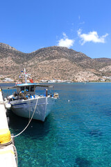 Wall Mural - Picturesque port of Kamares with traditional Cycladic character and beautiful sandy beach, Sifnos island, Cyclades, Greece