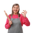 © New Africa - Happy woman with rolling pin showing ok gesture on white background