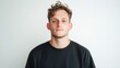 © shobakhul - Young Man with Light Brown Hair Wearing a Black Shirt