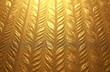 © miss irine - Shimmering gold leaf embossed surface close-up. Metallic golden texture shows leaf pattern. Luxury golden wallpaper, graphic design, ornate craft material, retro detail, elegant background.