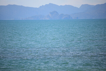 Close up shot of seawater under daylight showing gradient of blue colours. Abstract background. Beauty in nature. Environmental conservation.