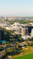 Wall Mural - Vertical video. Rome, Italy. Panoramic view. District EUR - Quarter is a vast complex of buildings built on the orders of dictator Benito Mussolini, Aerial View. Rich colors