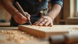 © Vadym - Close-up shot of carpenter marking wood board with scriber tool onsite. Craftsman creates custom cabinetry, woodworking in carpenter shop. Artisanal skill, attention detail during luxury residential