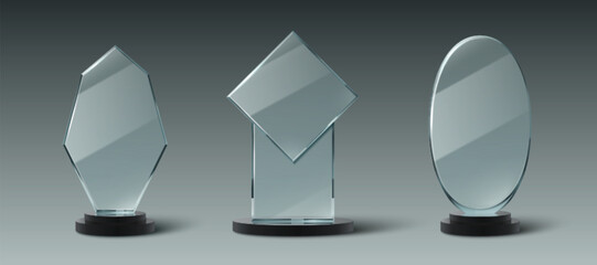 Wall Mural - glass trophy set with different shapes - rectangle, diamond, oval mounted on black bases. transparen