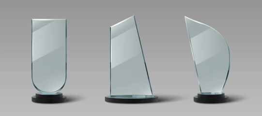 Wall Mural - glass trophy collection with transparent awards, black base stands, minimalist geometric shapes. rea
