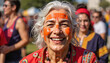 © LunaStar - Elder woman smiling with traditional face paint at cultural festival, joy