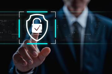 businessman touching on virtual screen key lock for secure access, featuring a prominent digital loc