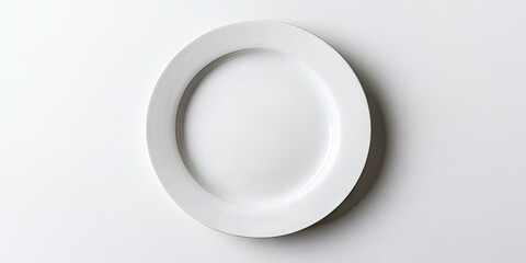 Poster - White ceramic plate centered on a smooth light gray background, highlighting its minimalistic design and clean lines for culinary elegance.