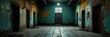 © Atittaya - Prisoners' cell with peeling paint and rusty bars, cold stone floor, iron gates