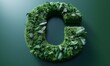 © Andreas - Green foliage letter G arranged with various plants. Generative AI