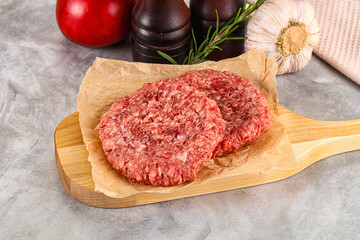 Wall Mural - Raw round beef cutlet minced meat