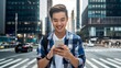 © Arshadul - Young Asian Man Using Smartphone in Modern City Urban Setting Happy Smiling Casual Style Technology Mobile Phone Street Scene Cityscape Background Daytime Outdoor Positive Communication Connection