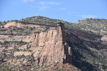 Wall Mural - Majestic rock formations under a blue sky in Colorado National Monument