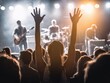 © Alexander Reitter - Audience And Crowd enthusiastically enjoying a live band performance with colorful stage lighting, capturing the energy and joy of live music experiences