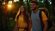 © Ghiska - Happy couple hiking forest sunset trail backpacking adventure