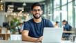 © UniqGraphicX - Young Indian Businessman Working on Laptop in Modern Office. Corporate and Professional Businessman