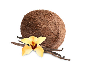 Wall Mural - Coconut, vanilla pods and flower isolated on white