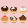 © sasa_elebea - Tasty Donuts on a Pink Background