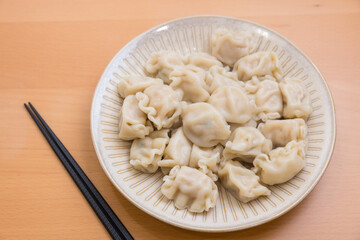 Wall Mural - Traditional Chinese Meat Dumpling on White Plate for Meal