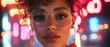 © MKS - The focal point of this image is a woman who has curly hair and wears big glasses