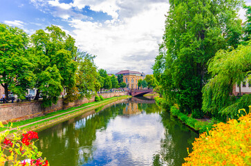 Wall Mural - Canal du Faux-Rempart with trees on bank, Quai Kleber embankment and bridge Fonderie in old town Strasbourg city historic Centre Ville Grande ile Grand Island, Alsace Grand Est region, France