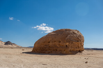 Aufkleber - Enormous rock formation in the Sinai desert showcasing the stark beauty of Egypts natural landscape under a clear blue sky