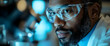 © Sri - African American Scientist in Lab Coat with Safety Glasses Doing Research in Lab