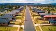 © Pannee - A suburban street with empty lots, showcasing the potential for residential development