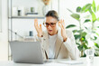 © Kateryna - Upset caucasian business woman with glasses expressing frustration while looking at laptop screen in office, depicting a stressful situation in a professional setting, unexpected bad results of work
