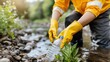 © FutureLens - Volunteer cleaning river of plastic waste to safeguard the environment