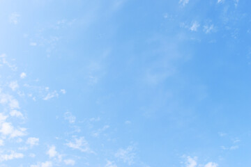 Wall Mural - beautiful blue sky and white fluffy group of clouds with sunrise in the morning, natural background