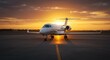 © IbragimovN - Private jet on tarmac at sunset capturing luxury travel and aviation serenity