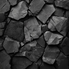 Poster - Striking black basalt columns: A textured display of geological formation and natural stone artistry.
