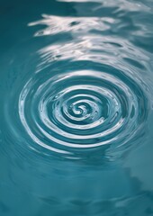 Wall Mural - Close-up of a spiral-like pattern in the water. the pattern is made up of multiple concentric circles that are arranged in a way that creates a sense of depth and dimension.