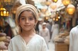 © c80 - Young child in traditional clothing smiles in a bustling market filled with lanterns and people