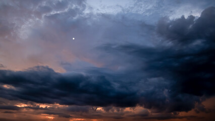 Wall Mural - dark sky with stormy clouds. dramatic sky rain,dark clouds before a thunder-storm.