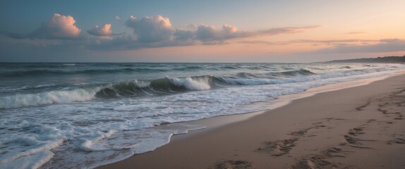 Canvas Print - Serene Dawn on Sandy Beach with Gentle Waves and Colorful Sky Reflections Over the Tranquil Sea Surface at Sunrise