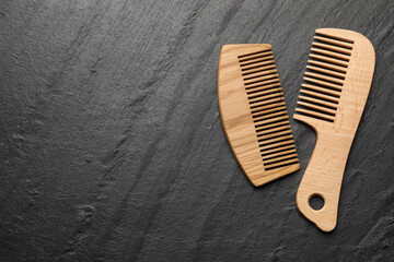 Wall Mural - Different wooden hair combs on grey background, top view. Space for text