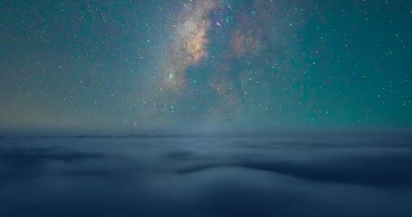 Wall Mural - Timelapse Milky Way over sea of fog