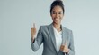 © Simon - Professional woman smiling, thumbs up, confident woman, happy businesswoman