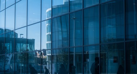 Reflections of urbanity, contemporary architecture mirrored in blue glass