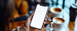 © Bartek - Businesswoman Holding Smartphone with Blank Screen Mockup in Coffee Shop for Social Media Marketing