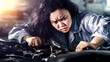 © Frank - Young asian female mechanic repairing car engine in garage