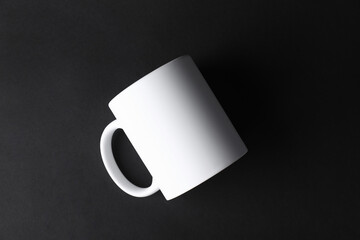 Sticker - One blank white mug on black background, top view. Mockup for design