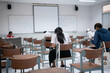 © EduLife Photos - University Students Taking an Exam in a Classroom