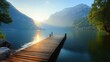 © Diffin - Arafed wooden dock extends over a serene lake, framed by majestic mountains under a clear sky, inviting tranquility and reflection in nature.