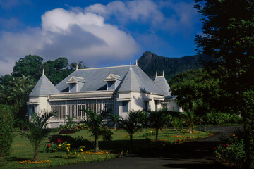 traditional colonial building in tropical setting. mauritius island nature and lifestyle.