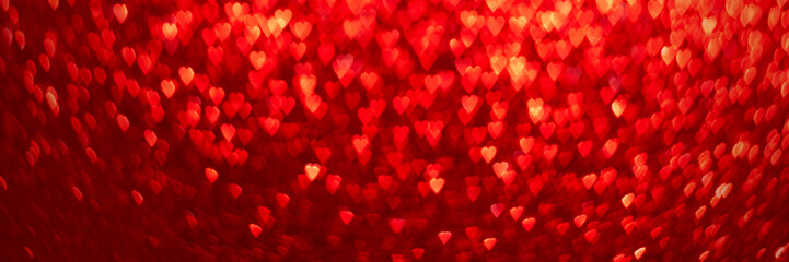 Wall Mural - Red hearts, sparkling glitter bokeh background banner, valentines day abstract defocused texture header.