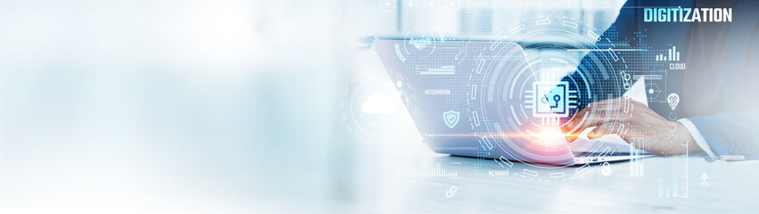 Digitization: Businessman uses laptop to analyze and develop various information about digital transformation on future virtual interface. Data conversion, automation, cloud computing